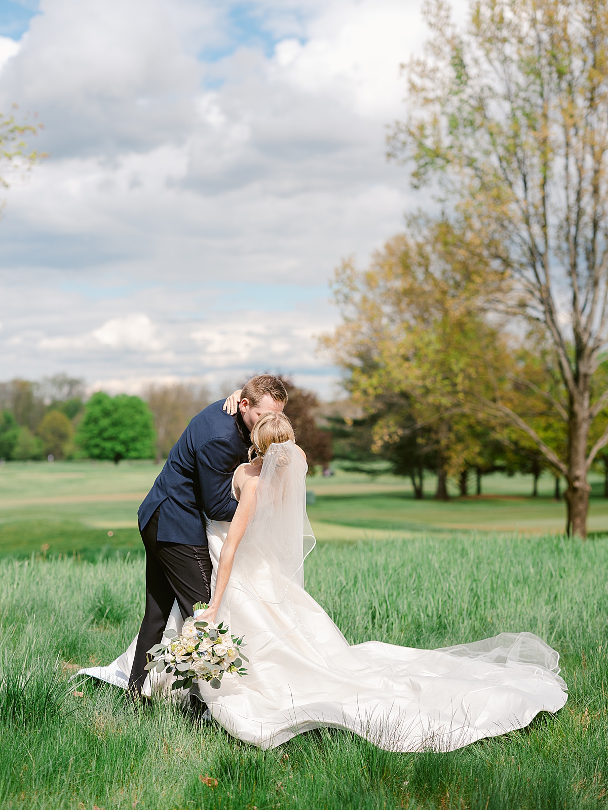 Fiddler's Elbow country club golf course picture with bride and groom spring wedding
